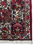 Bachtiar Teppich ca. 150 × 100 cm – rot/dunkelblau/creme & gemustert