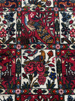 Bachtiar Teppich ca. 150 × 100 cm – rot/dunkelblau/creme & gemustert