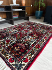 Bachtiar Teppich ca. 150 × 100 cm – rot/dunkelblau/creme & gemustert