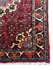 Bidjar Teppich ca. 150 × 100 cm – rot/blau & floral gemustert