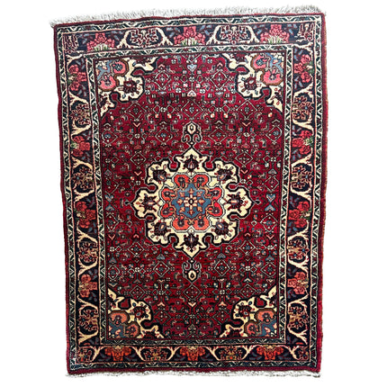 Bidjar Teppich ca. 150 × 100 cm – rot/blau & floral gemustert