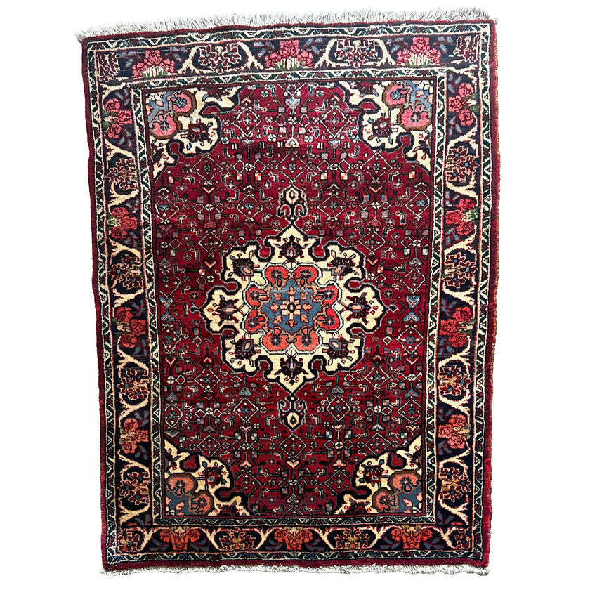 Bidjar Teppich ca. 150 × 100 cm – rot/blau & floral gemustert