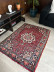 Bidjar Teppich ca. 150 × 100 cm – rot/blau & floral gemustert