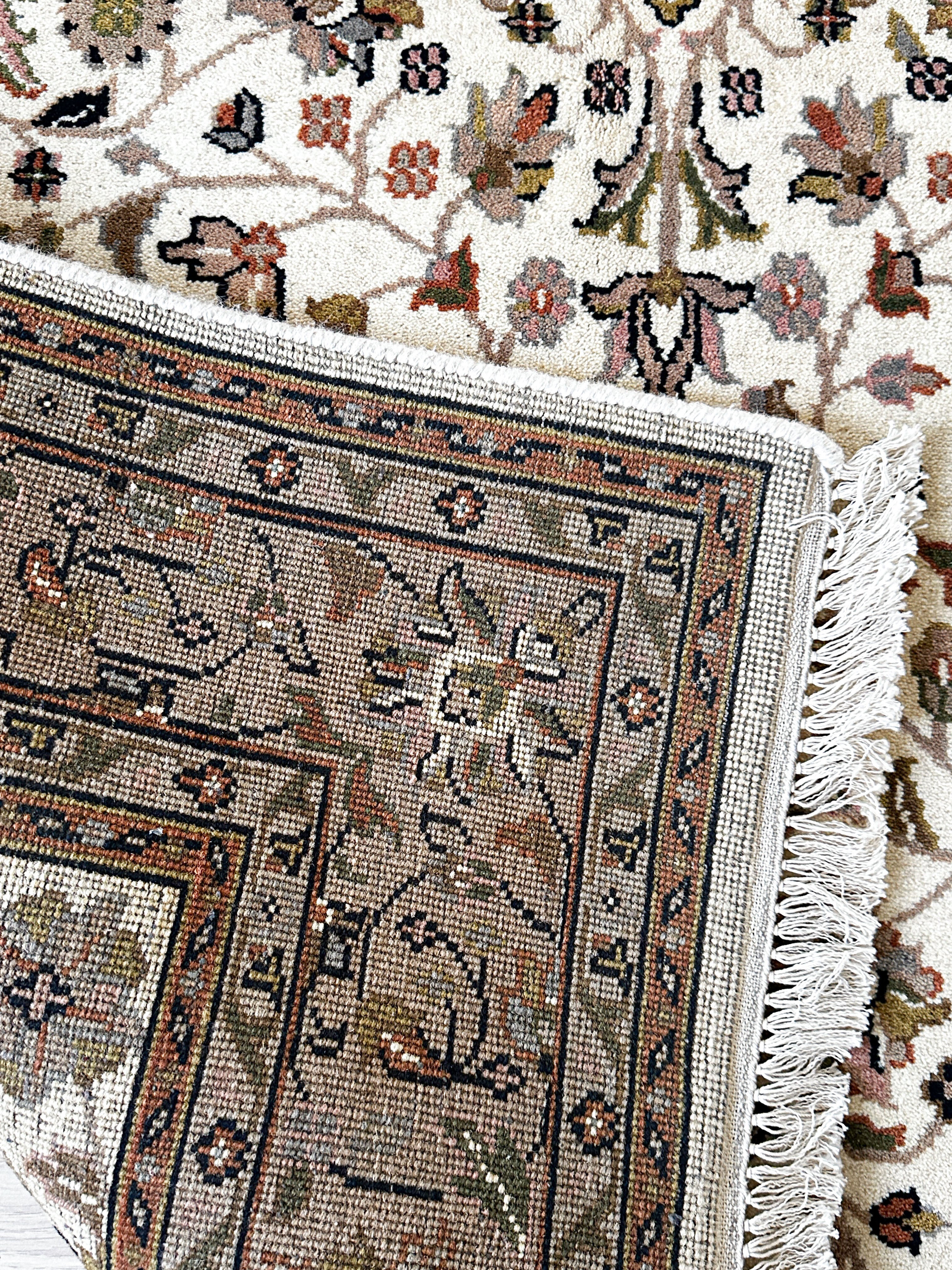 Ganga Teppich ca. 200 × 150 cm – creme/braun & floral