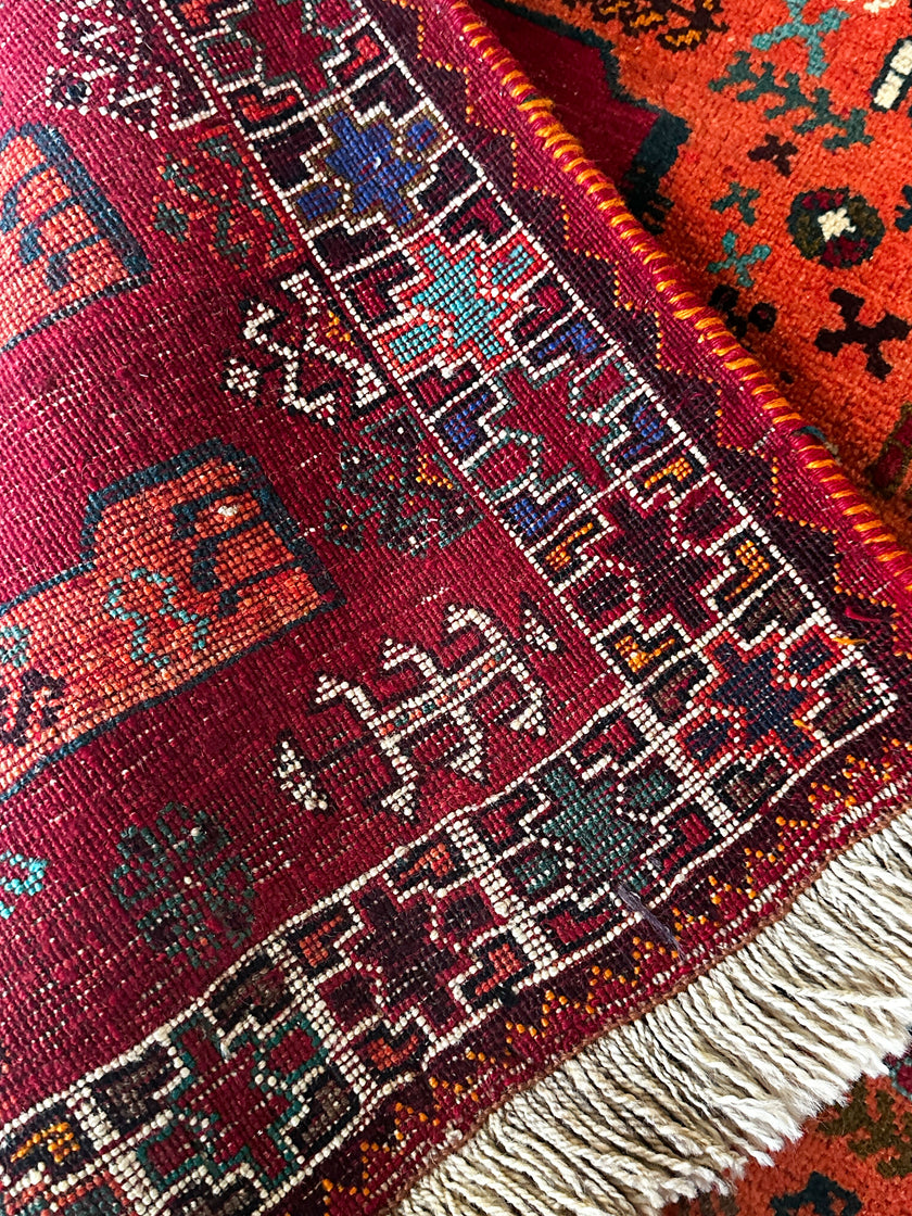 Gaschghai Teppich ca. 200 × 150 cm – rot/orange & figürliches Nomadenmuster