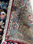 Ghoum Teppich ca. 150 × 100 cm – dunkelblau/rot/blau & floral