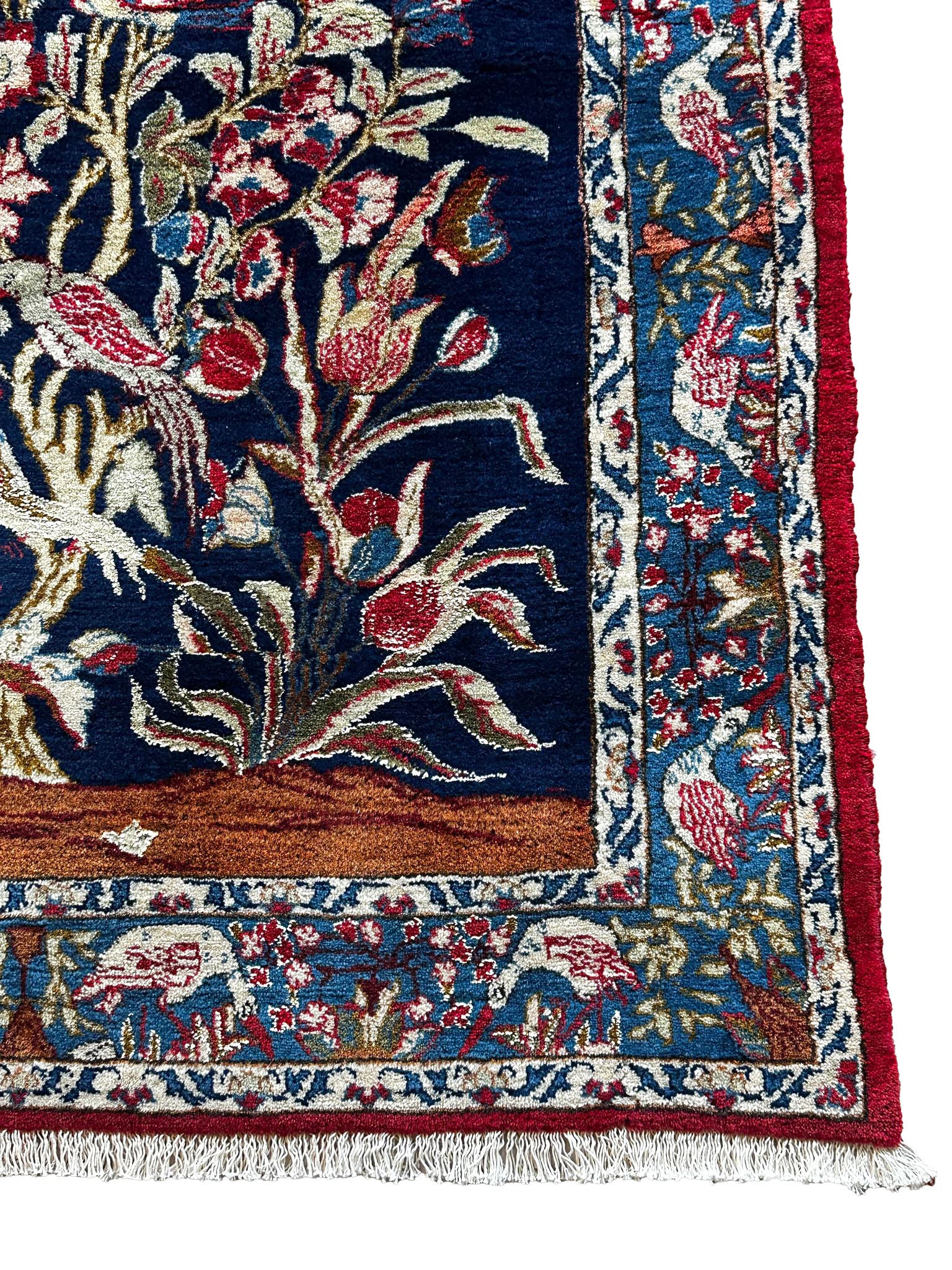 Ghoum Teppich ca. 150 × 100 cm – dunkelblau/rot/blau & floral