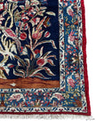 Ghoum Teppich ca. 150 × 100 cm – dunkelblau/rot/blau & floral
