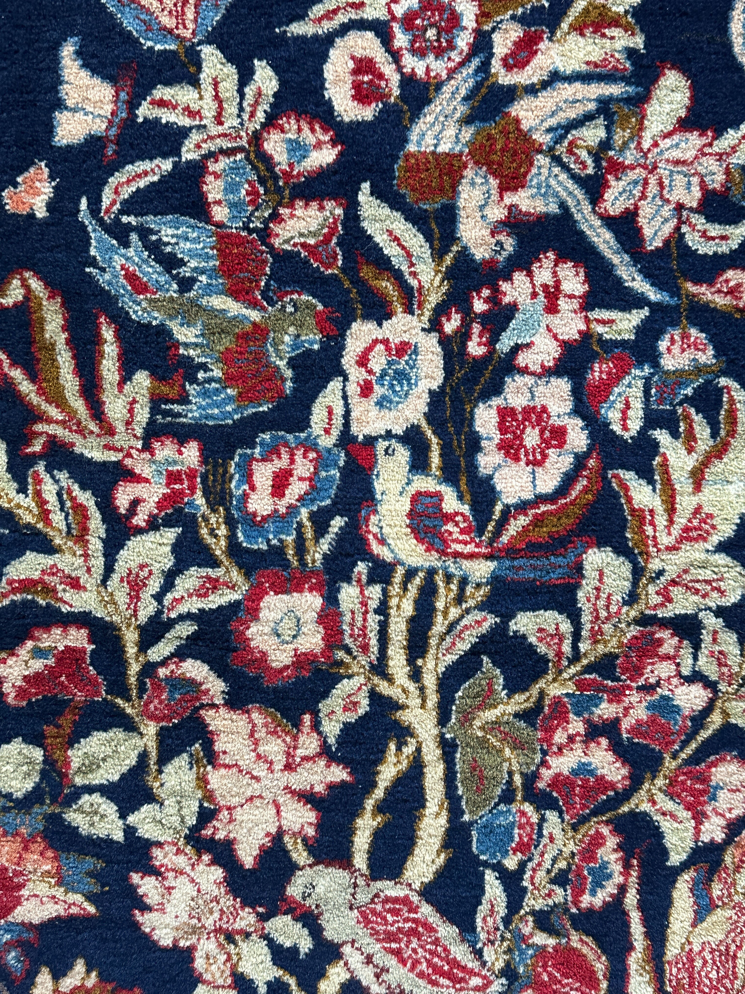 Ghoum Teppich ca. 150 × 100 cm – dunkelblau/rot/blau & floral