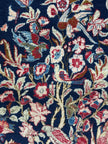 Ghoum Teppich ca. 150 × 100 cm – dunkelblau/rot/blau & floral
