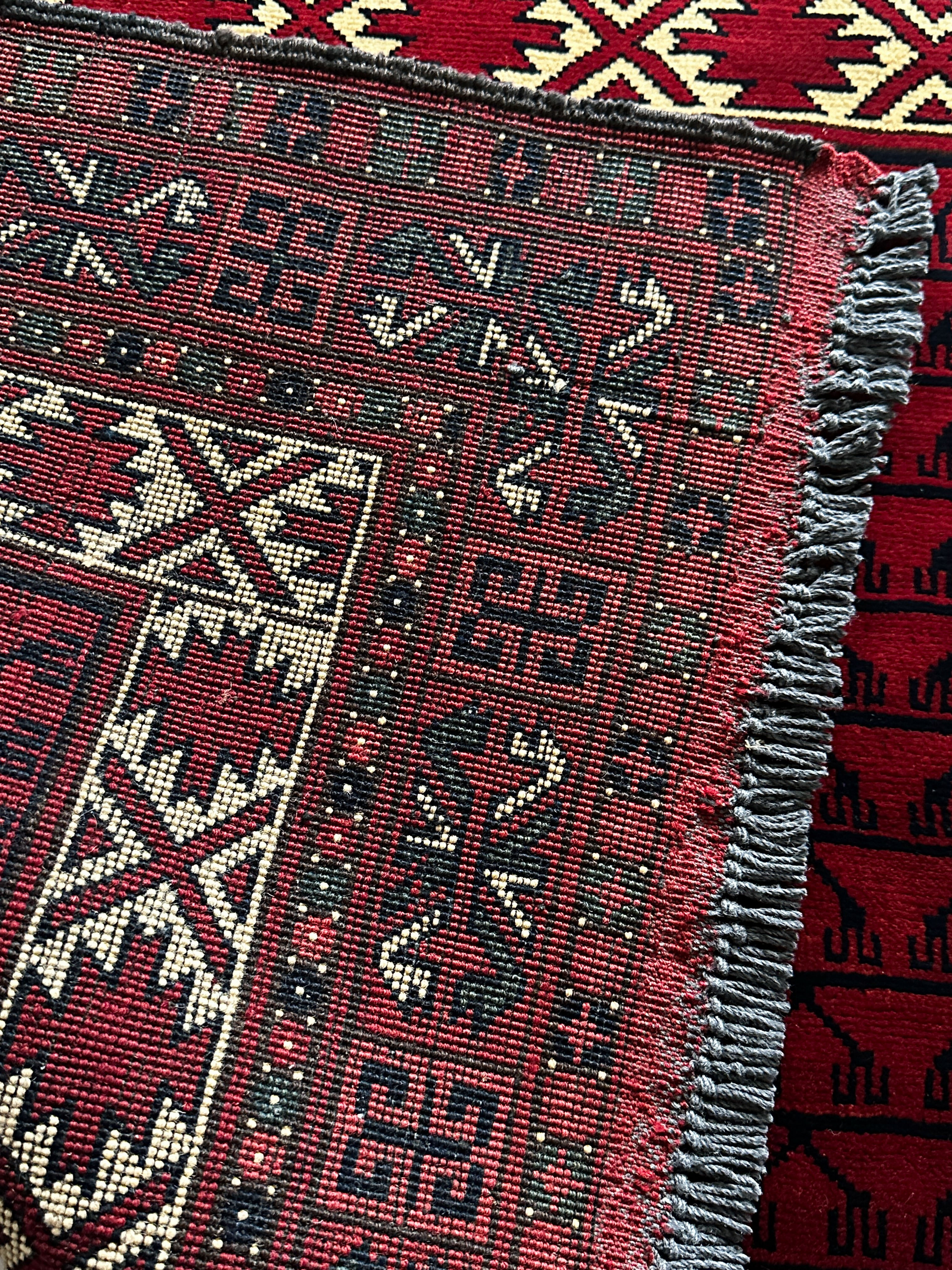 Hatschlu Teppich ca. 150 × 100 cm – rot/creme/schwarz & geometrisch