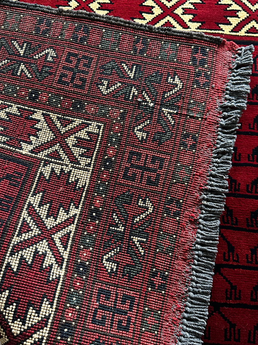 Hatschlu Teppich ca. 150 × 100 cm – rot/creme/schwarz & geometrisch