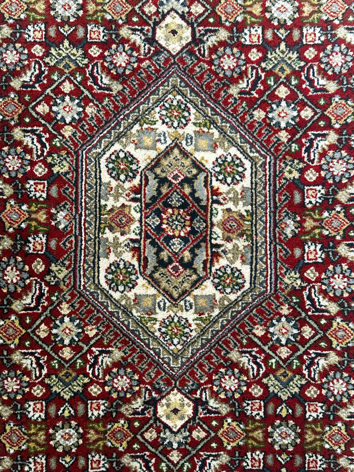 Bidjar Teppich ca. 163 × 94 cm – rot, creme & grün