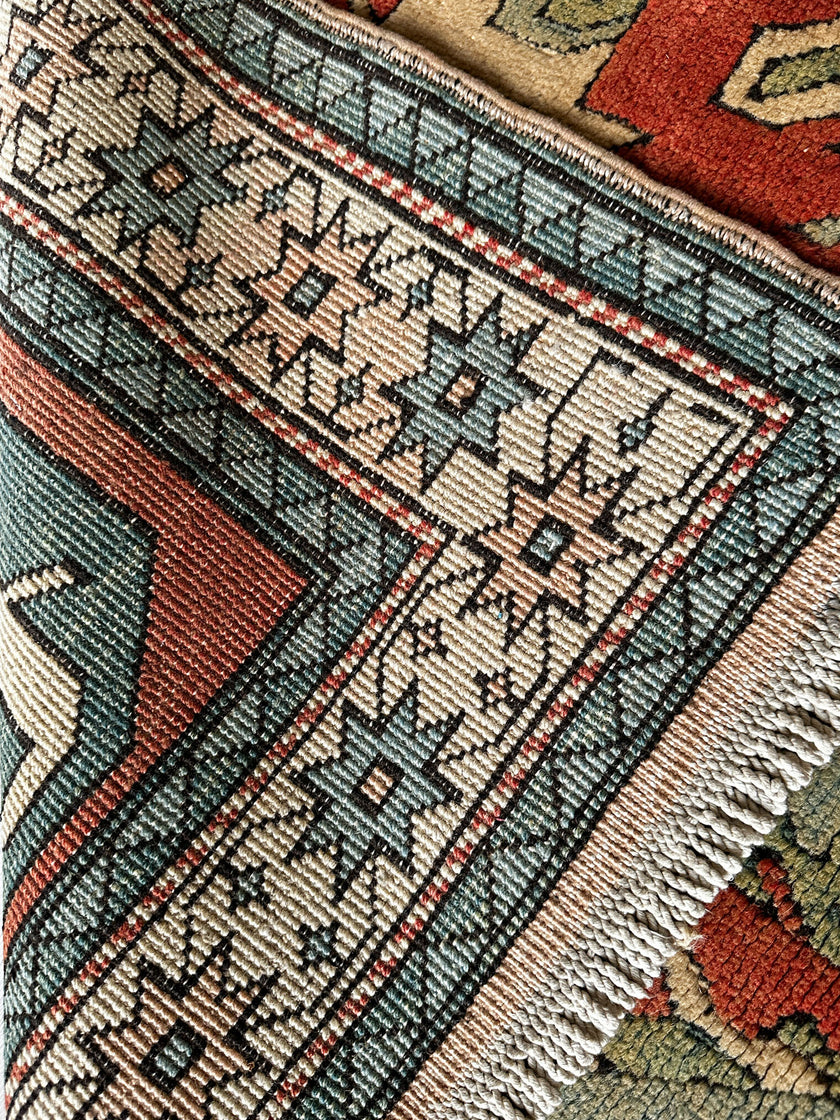 Kars Teppich ca. 233 × 149 cm – rostrot & olivgrün geometrisch