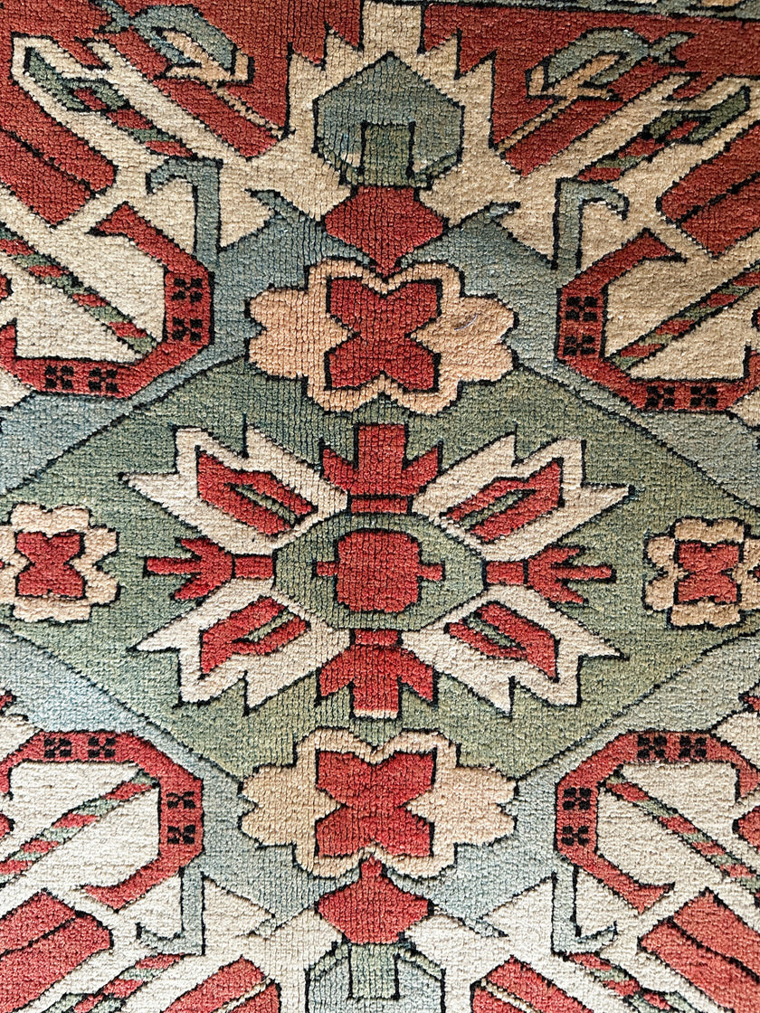 Kars Teppich ca. 233 × 149 cm – rostrot & olivgrün geometrisch