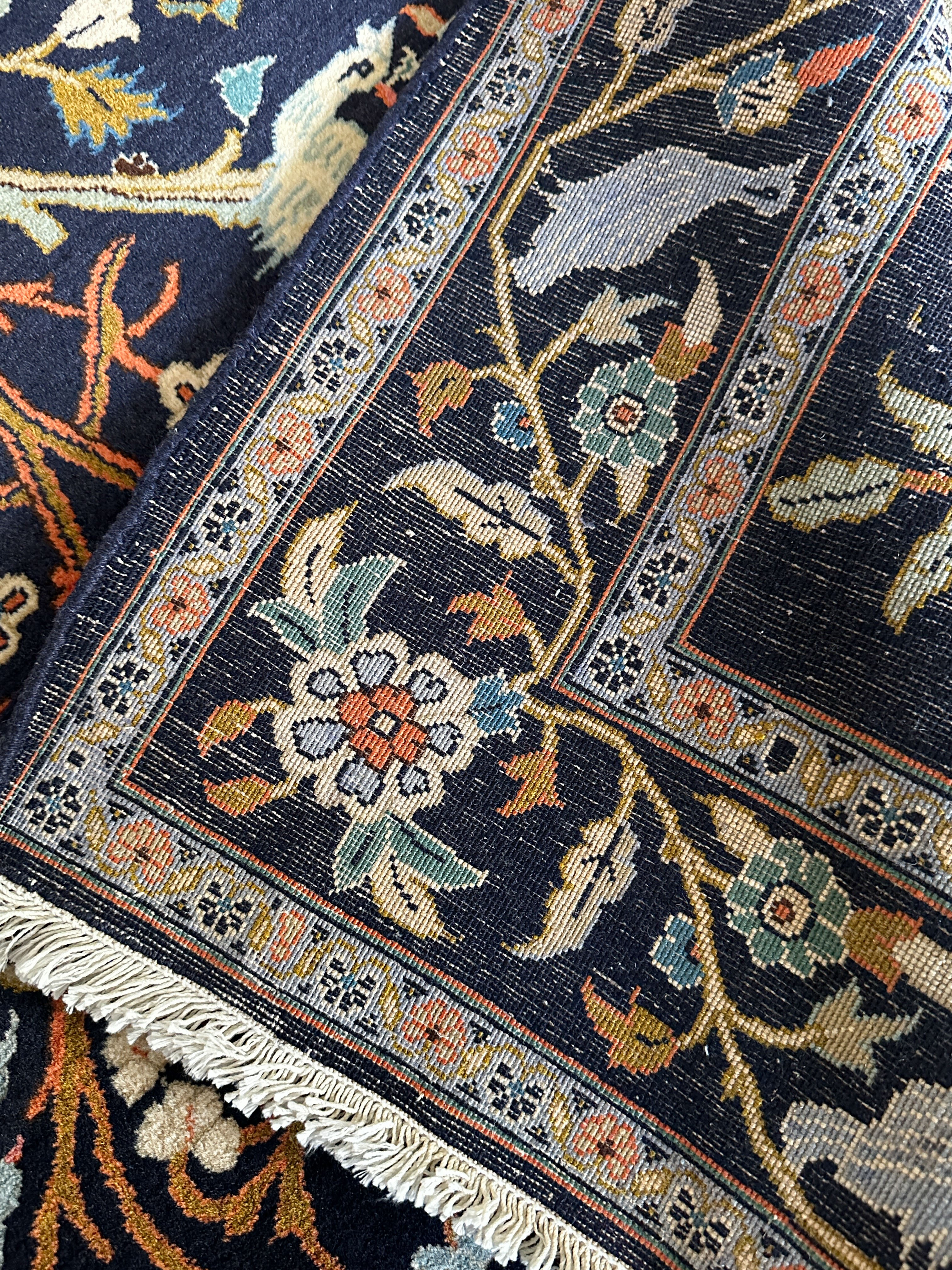 Keschan Teppich ca. 150 × 100 cm – dunkelblau/creme & floral