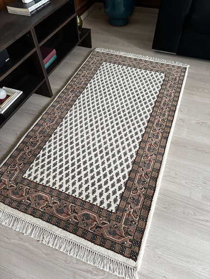 Leetchi Teppich ca. 150 × 80 cm – creme & braun