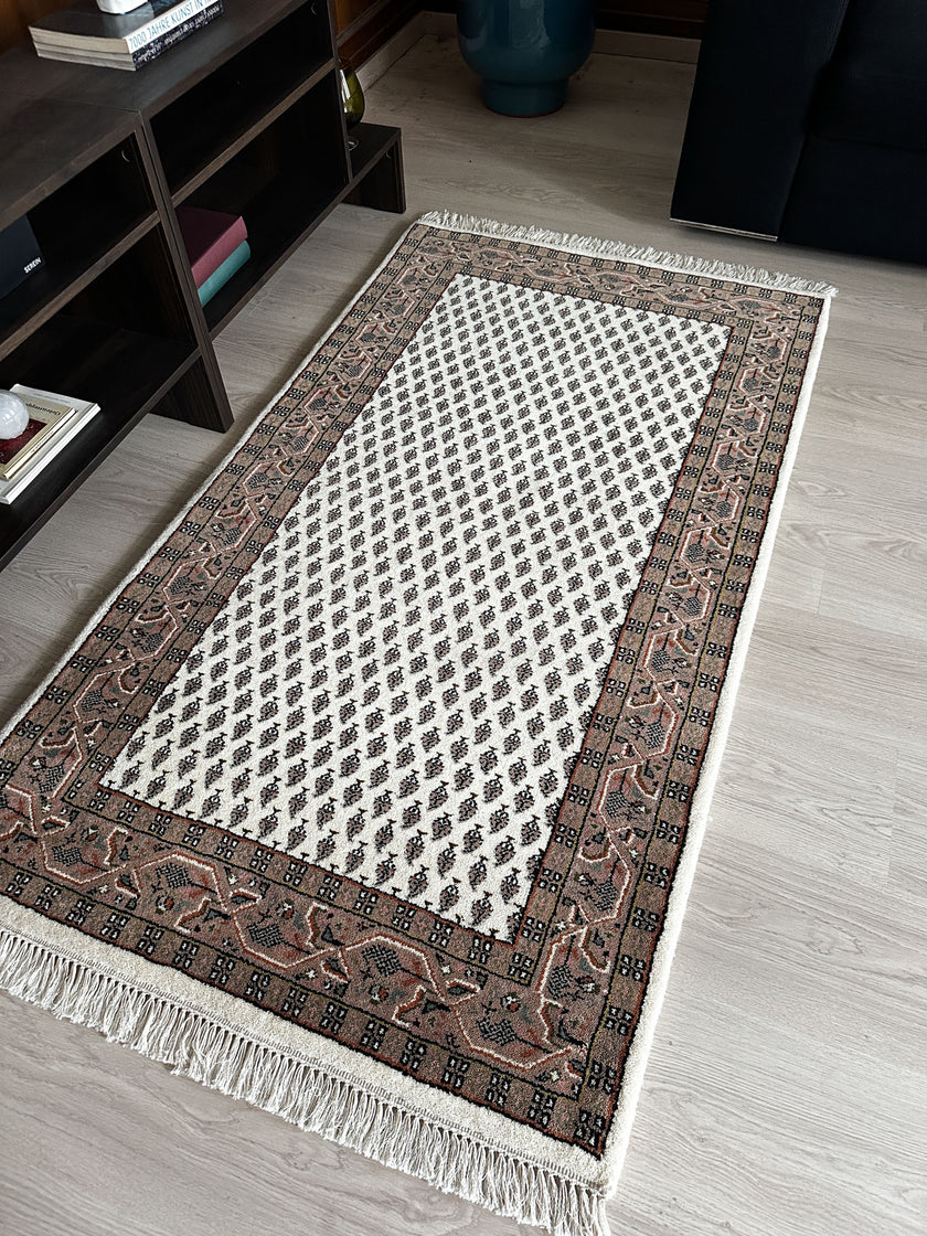 Leetchi Teppich ca. 150 × 80 cm – creme & braun