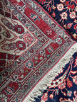 Malayer Teppich ca. 232 × 135 cm – dunkelblau & rot floral