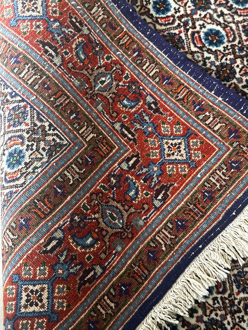 Moud Teppich ca. 154 × 104 cm – creme, rot & blau