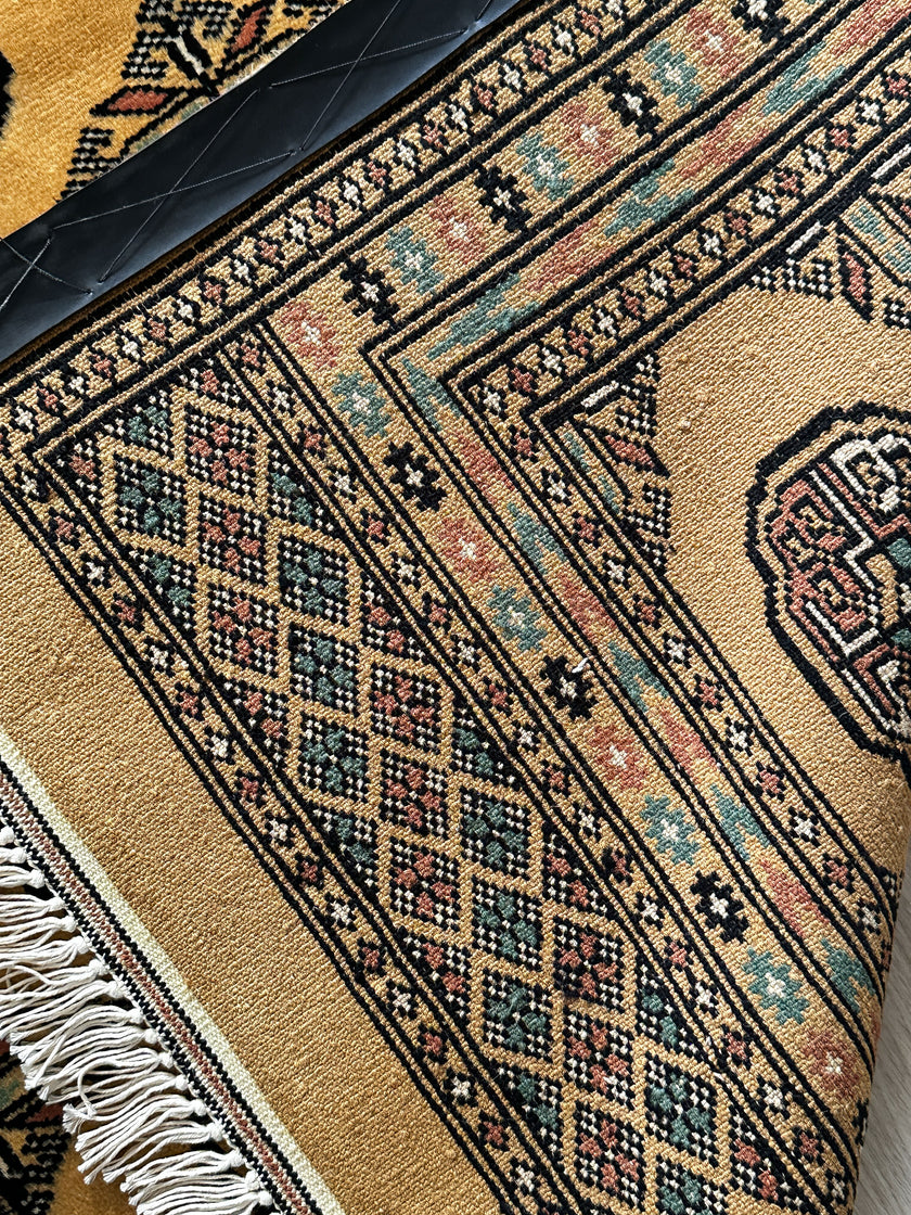 Mouri Teppich ca. 150 × 100 cm – honiggelb/dunkelbraun/hellgrün & klassisch