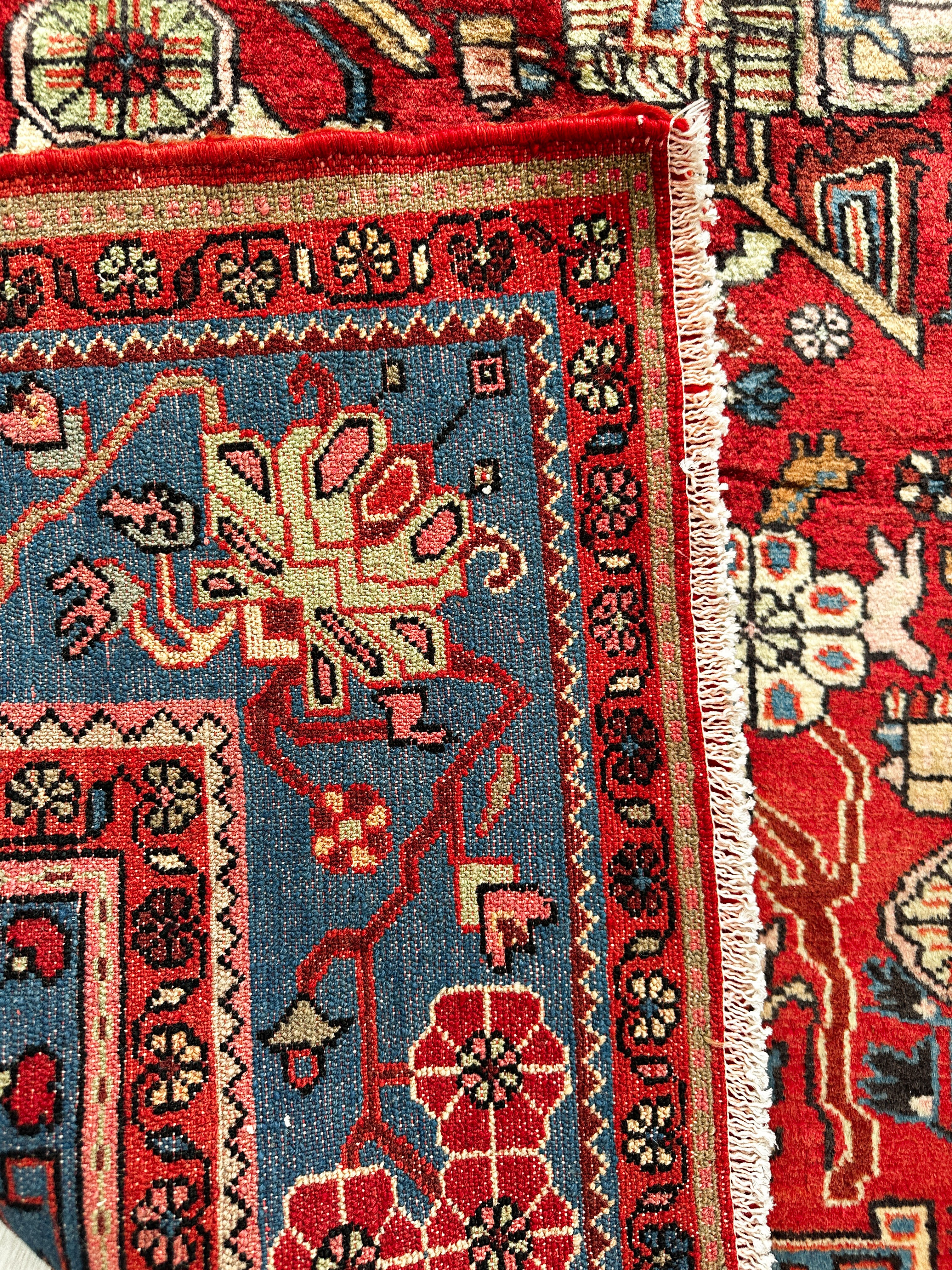 Nahawand Teppich ca. 300 × 200 cm – rot/blau & ausdrucksstark