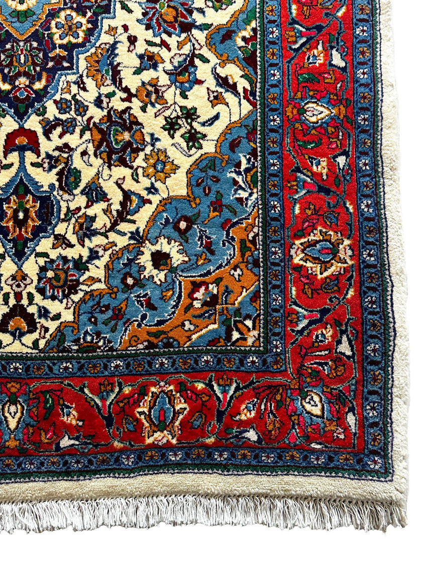 Sarough Teppich ca. 150 × 100 cm – creme/rot/blau & floral gemustert