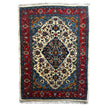 Sarough Teppich ca. 150 × 100 cm – creme/rot/blau & floral gemustert