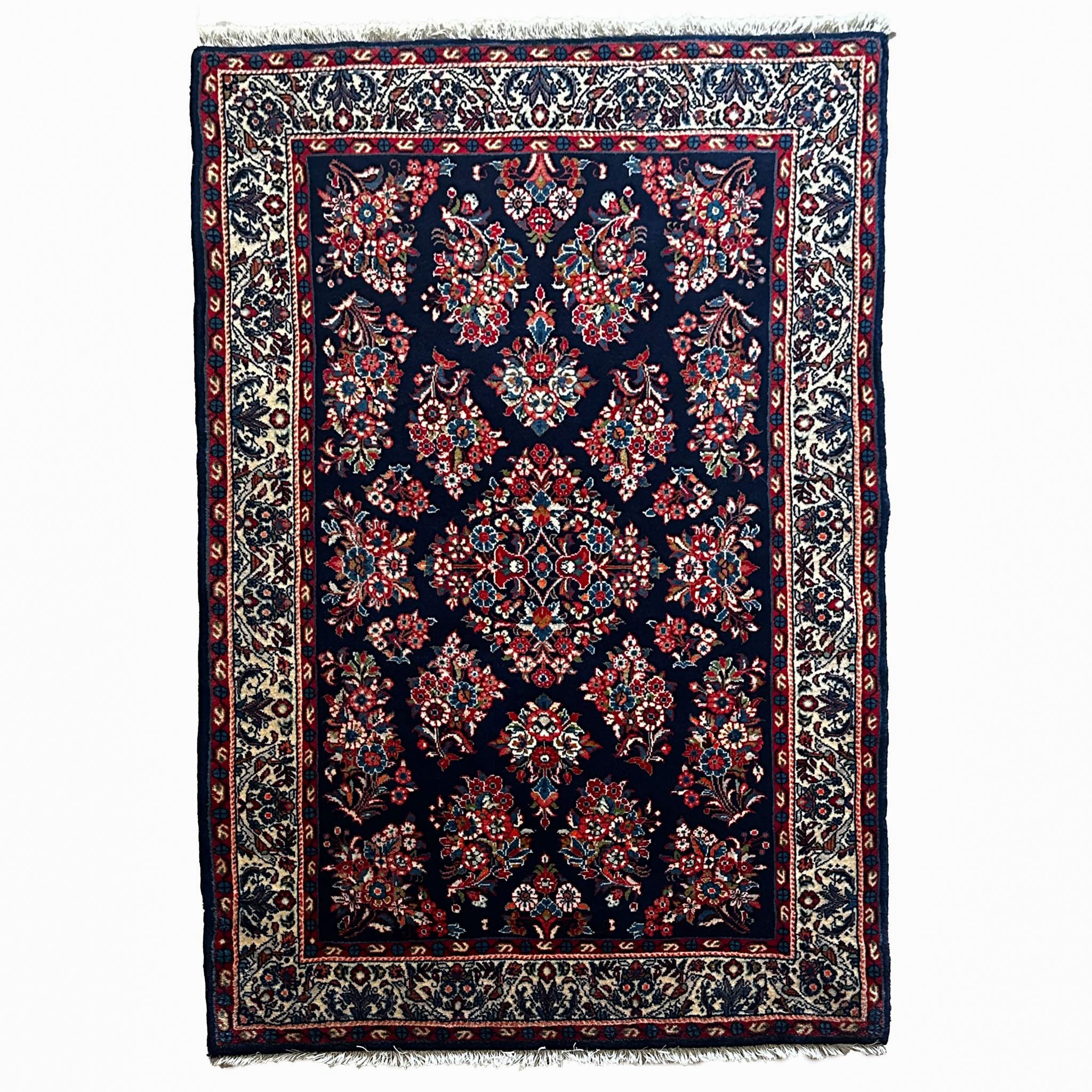 Sarough Teppich ca. 150 × 100 cm – dunkelblau/creme/rot & floral