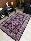 Sarough Teppich ca. 150 × 100 cm – dunkelblau/creme/rot & floral