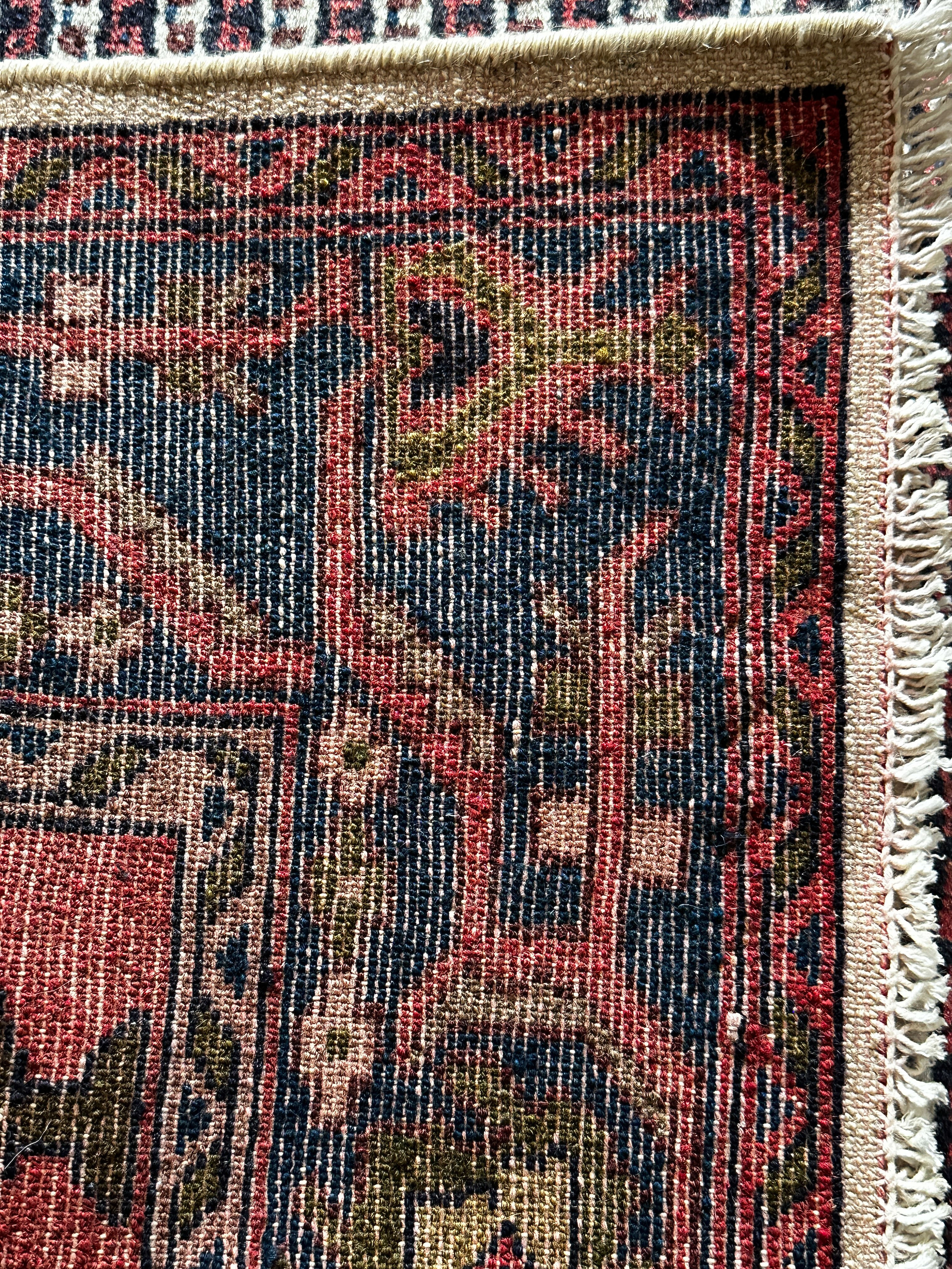 Songhor Teppich ca. 150 × 100 cm – rosa/blau & geometrisch