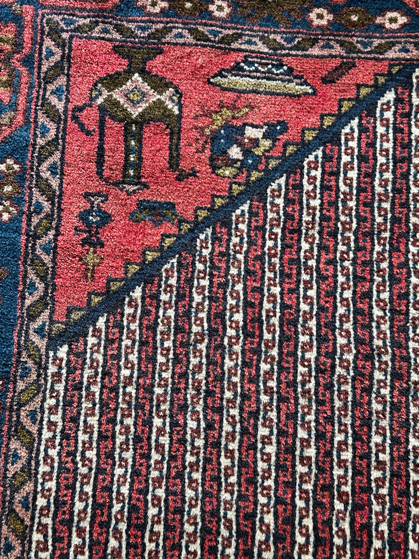 Songhor Teppich ca. 150 × 100 cm – rosa/blau & geometrisch