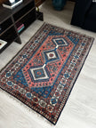 Yalameh Teppich ca. 150 × 100 cm – blau/rosa & geometrisch