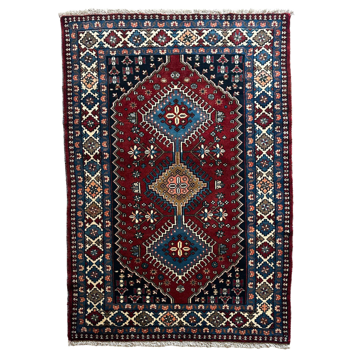 Yalameh Teppich ca. 150 × 100 cm – rot/blau/creme & geometrisch gemustert