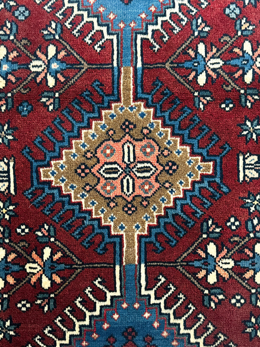 Yalameh Teppich ca. 150 × 100 cm – rot/blau/creme & geometrisch gemustert
