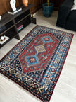 Yalameh Teppich ca. 150 × 100 cm – rot/blau/creme & geometrisch gemustert